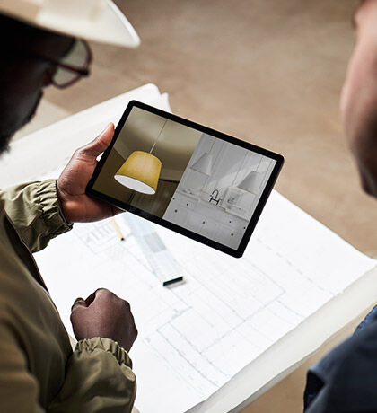 Professional-grade lighting fixture compared next to cheaper online alternative