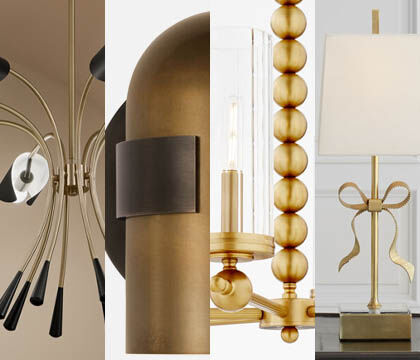 Warm metal lighting finishes such as aged brass and champagne bronze trending for 2026.