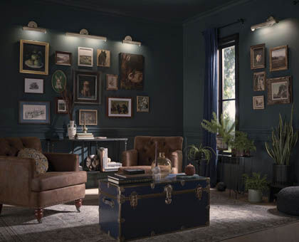 Picture lights can accent architectural details and wall decor for moments of visual interest around the room