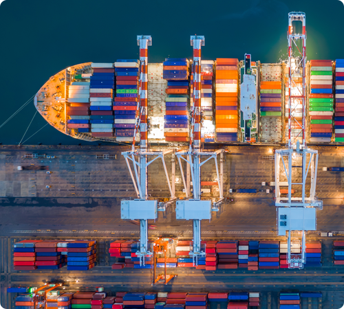 Global supply chain and shipping containers illustrating how tariffs affect decorative lighting industry logistics