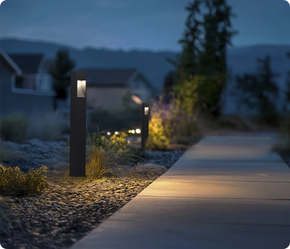 Landscape lighting adding pathway visibility in a residential community