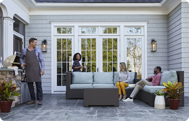 An outdoor kitchen & conversation space is perfect for summer gatherings