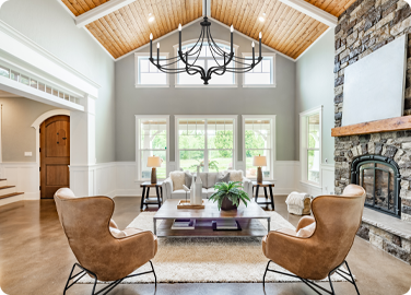 A traditional chandelier works wonders in a space with warm wood tones and stonework.