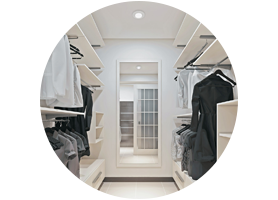 A walk-in closet doesn&rsquo;t need to be glamorous - simple overhead lighting helps your wardrobe shine.