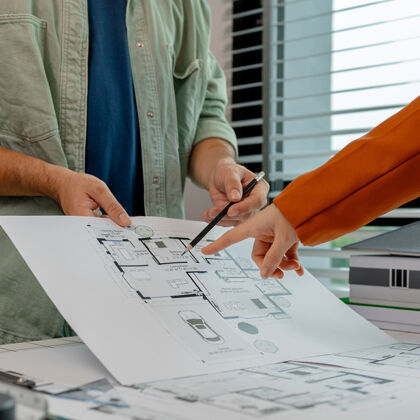 A designer and client collaborate to determine where to focus a lighting budget.