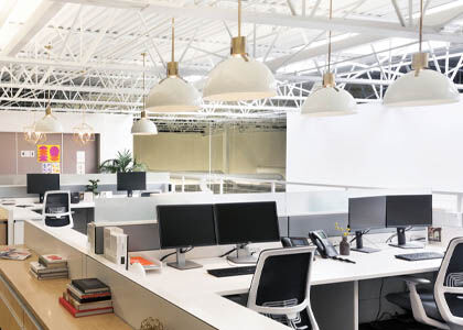 Commercial office space designed with sustainable, energy-efficient lighting for ESG compliance