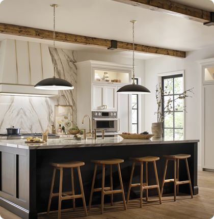 Clients easily notice the central island lighting, but may overlook the cabinet lighting that adds to the appeal of this kitchen space.