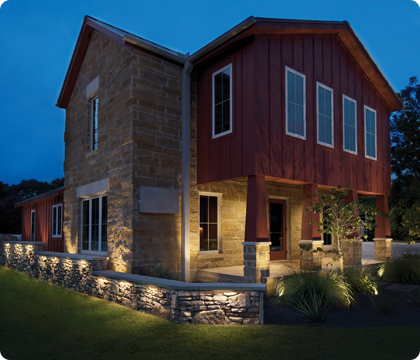 Landscape lighting creating depth and visual interest in a residential backyard