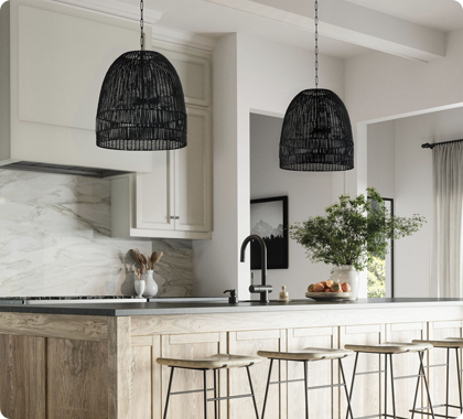 A pair of pendants over a kitchen island provide essential lighting while adding a touch of style.