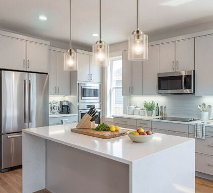 Mismatched lighting color temperatures causing uneven light in a kitchen design.