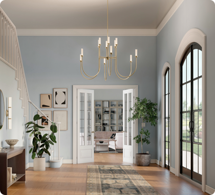Large chandelier designed for two story foyer ceiling height.