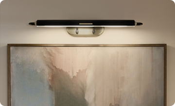An accent light adds emphasis to decorative features around your space