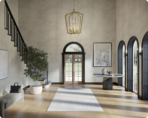  Great room with tall ceilings featuring large chandelier lighting designed for open spaces