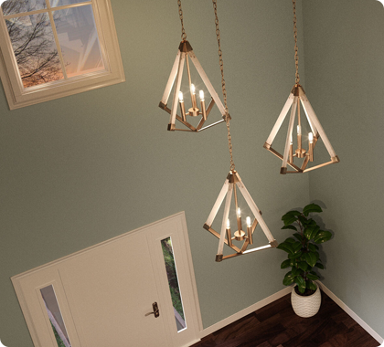 Cascading pendant lighting installation in a tall staircase for vertical visual impact.