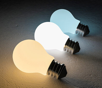 Light bulbs showing warm, neutral, and cool lighting used in human-centric design.