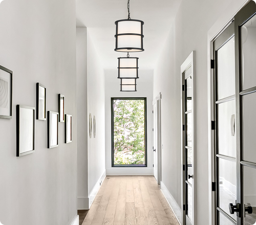  Well-designed hallway featuring functional residential lighting