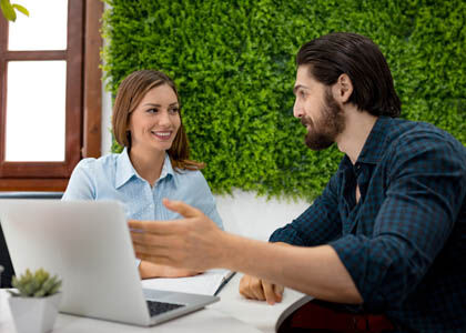 Designer and client meeting to set pricing expectations on an upcoming project.