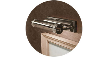 A picture light on the wall perfectly accents wall art.