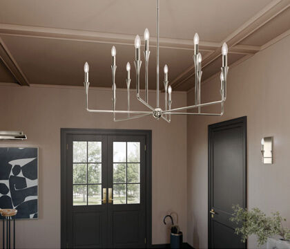 Hero fixture lighting strategy showing a statement chandelier used with budget-friendly supporting fixtures.