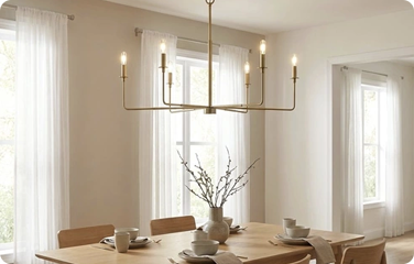 A stylish chandelier above a dining room table
