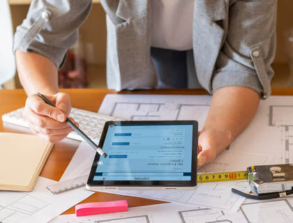 A designer updates their product choices and spec sheets as needed throughout the project.