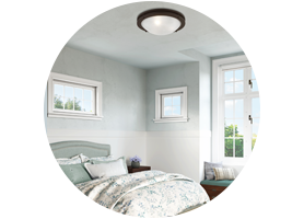A builder-grade flush mount can be a great starting point for a cozy bedroom of any style.