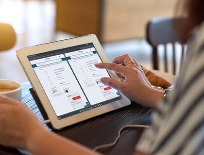 A designer prepares their lighting substitution matrix showing alternative fixtures with matching style and finish.