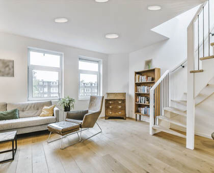 Understated flush mounts provide ambient lighting without stealing the spotlight.