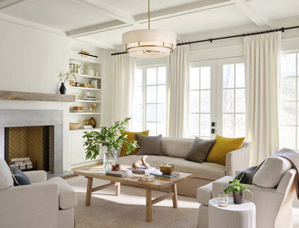 A well-lit living space with ambient and accent lighting, as well as natural light for energy-saving daytime use.