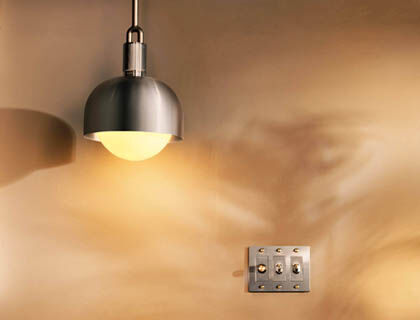 A pendant and dimmer switch provide a budget-friendly alternative to smart fixtures.