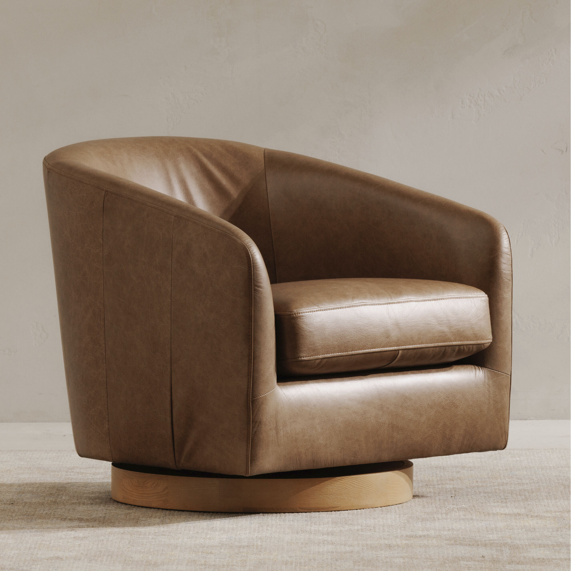 Oscy Brown Swivel Chair in Tan