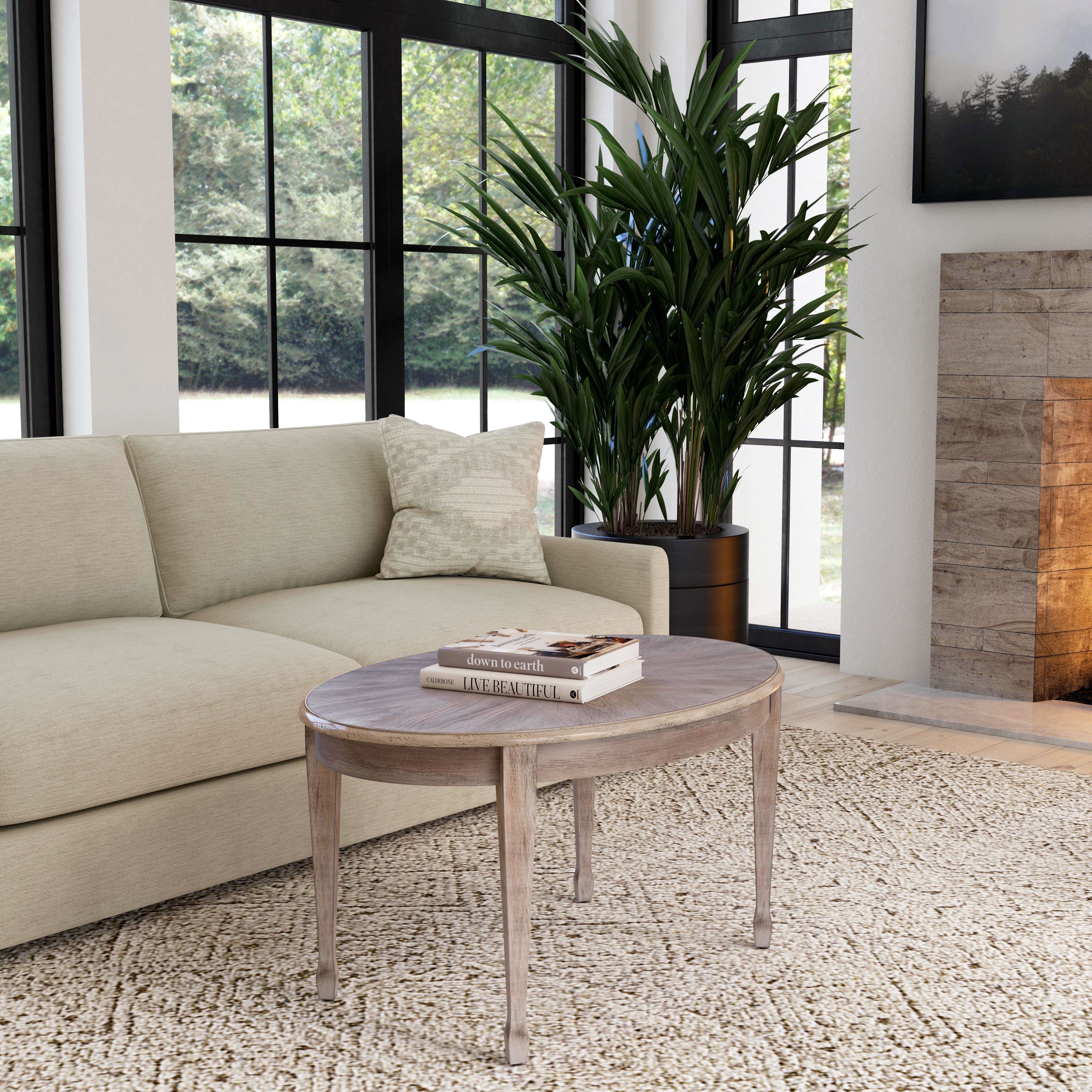 Clayton Oval Wood Coffee Table in Natural Wood