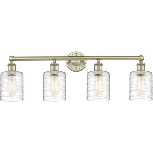 Cobbleskill 4 Light 32 inch Antique Brass Bath Vanity Light Wall Light in Deco Swirl