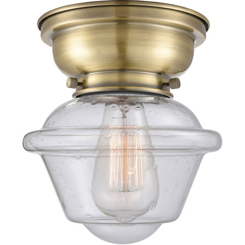 Aditi Small Oxford LED 7.5 inch Antique Brass Flush Mount Ceiling Light in Seedy Glass, Aditi