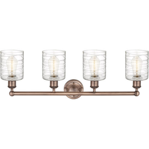 Cobbleskill 4 Light 32 inch Antique Copper Bath Vanity Light Wall Light in Deco Swirl