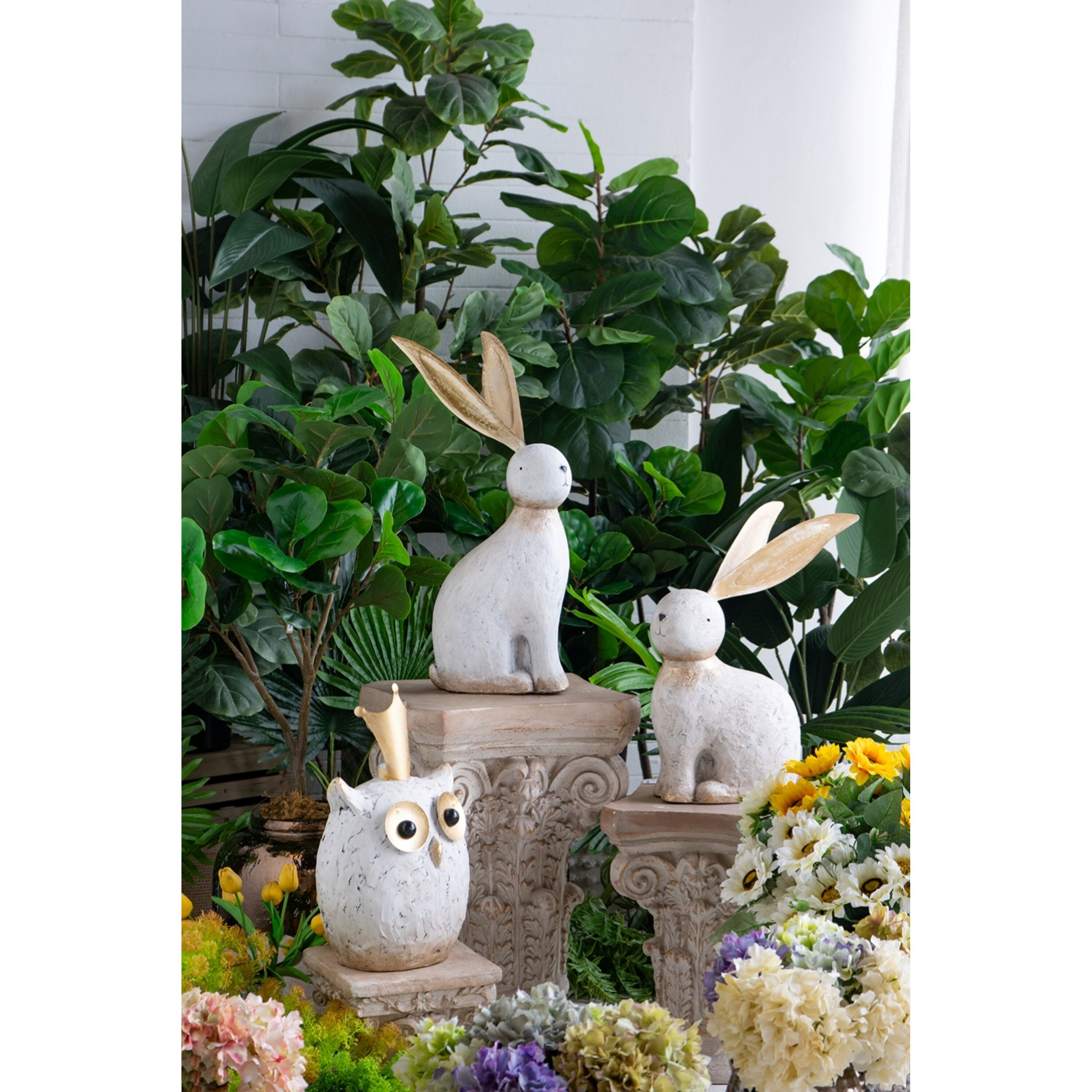 Anita White and Gold Statue