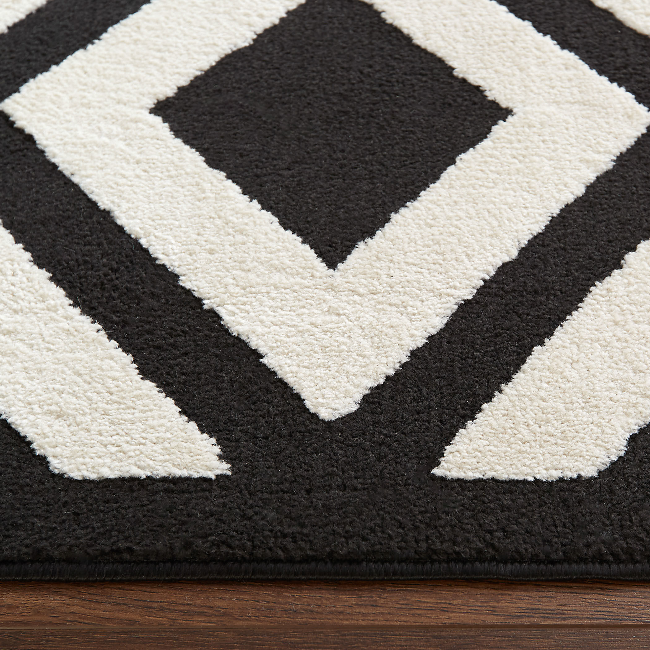 Optika 130 X 94 inch Black/White Rug in 8 x 11