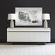 Denny White with Green and Silver Framed Wall Art