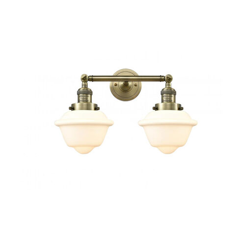 Franklin Restoration Small Oxford 2 Light 17 inch Antique Brass Bath Vanity Light Wall Light in Incandescent, Matte White Glass, Franklin Restoration