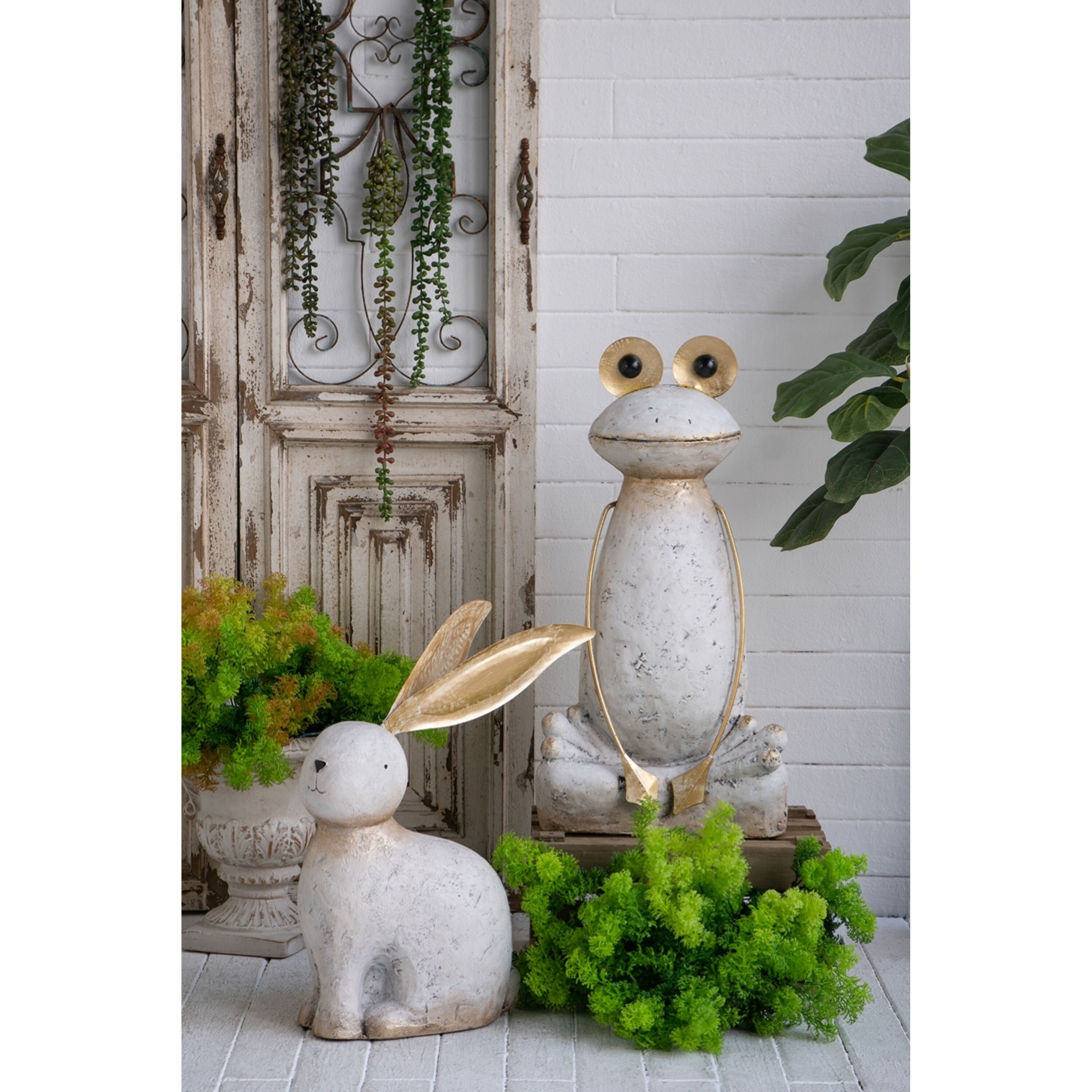 Anita White and Gold Statue