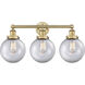 Beacon 3 Light 24.5 inch Brushed Brass Bath Vanity Light Wall Light in Clear