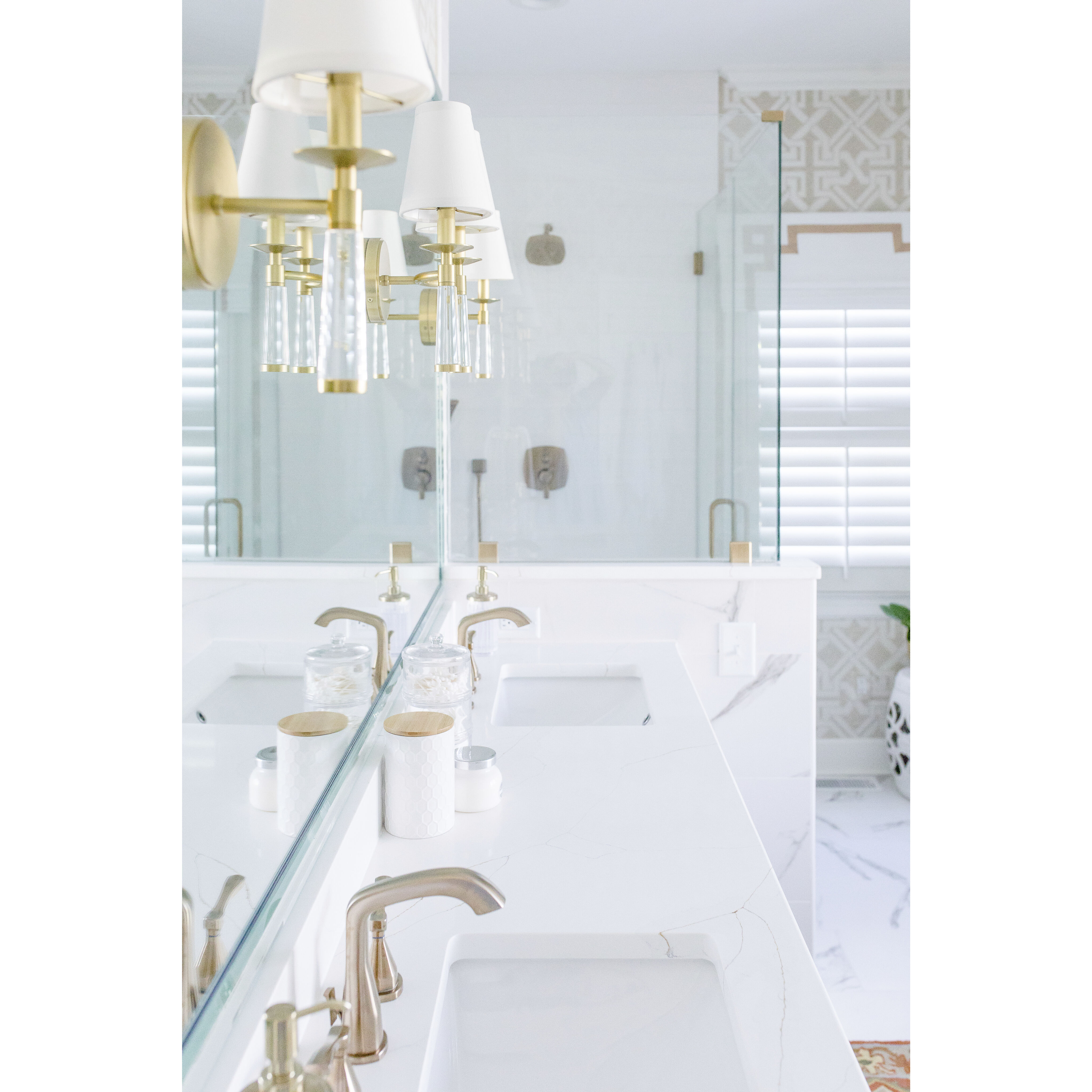 Baxter Sconce Wall Light in Aged Brass