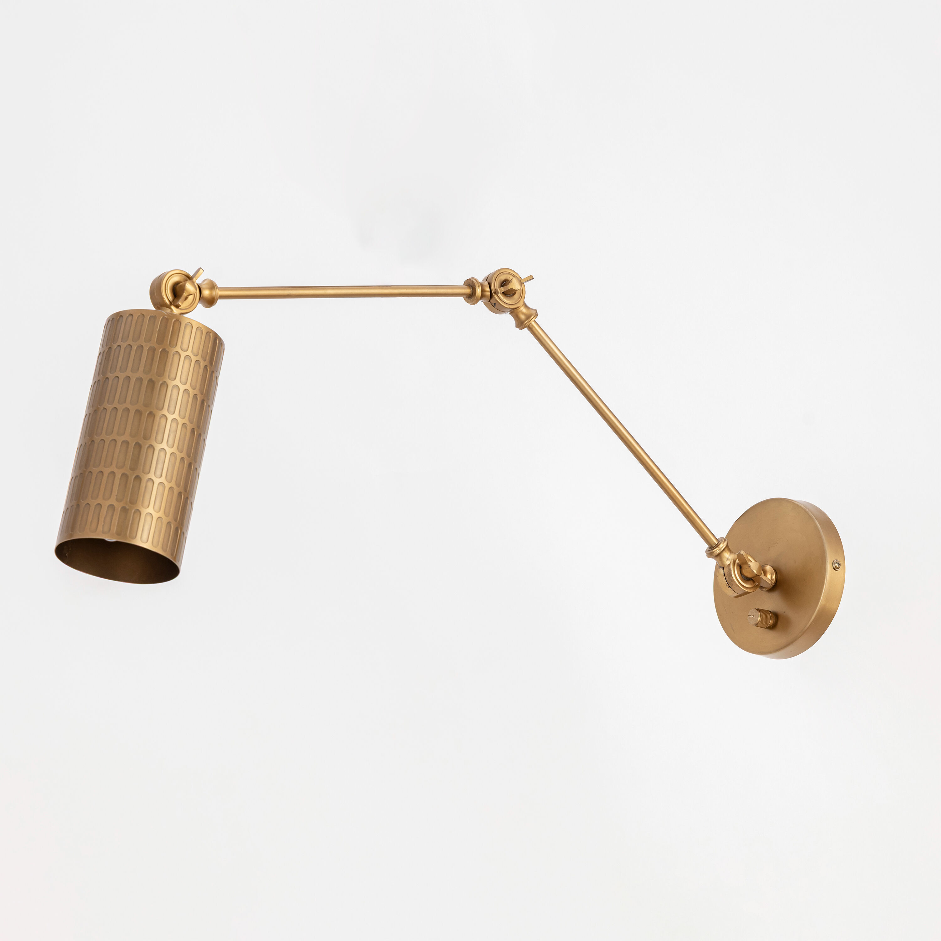 Shaka Wall Sconce Wall Light in Weathered Brass