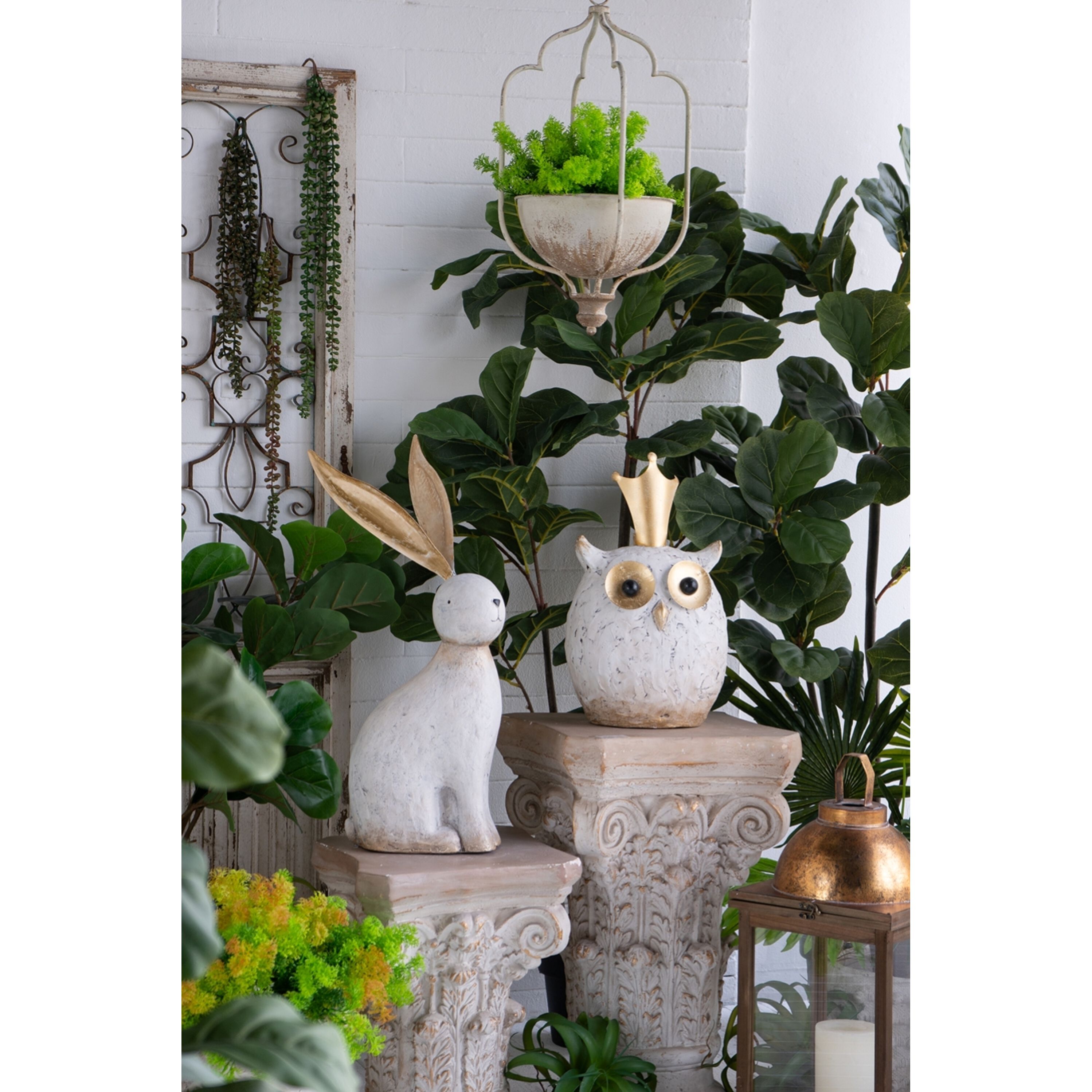 Anita White and Gold Statue