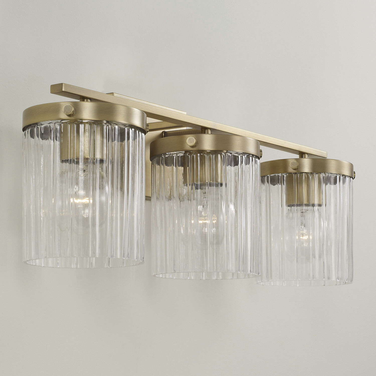 Vaughn 3 Light 23.25 inch Aged Brass Vanity Light Wall Light