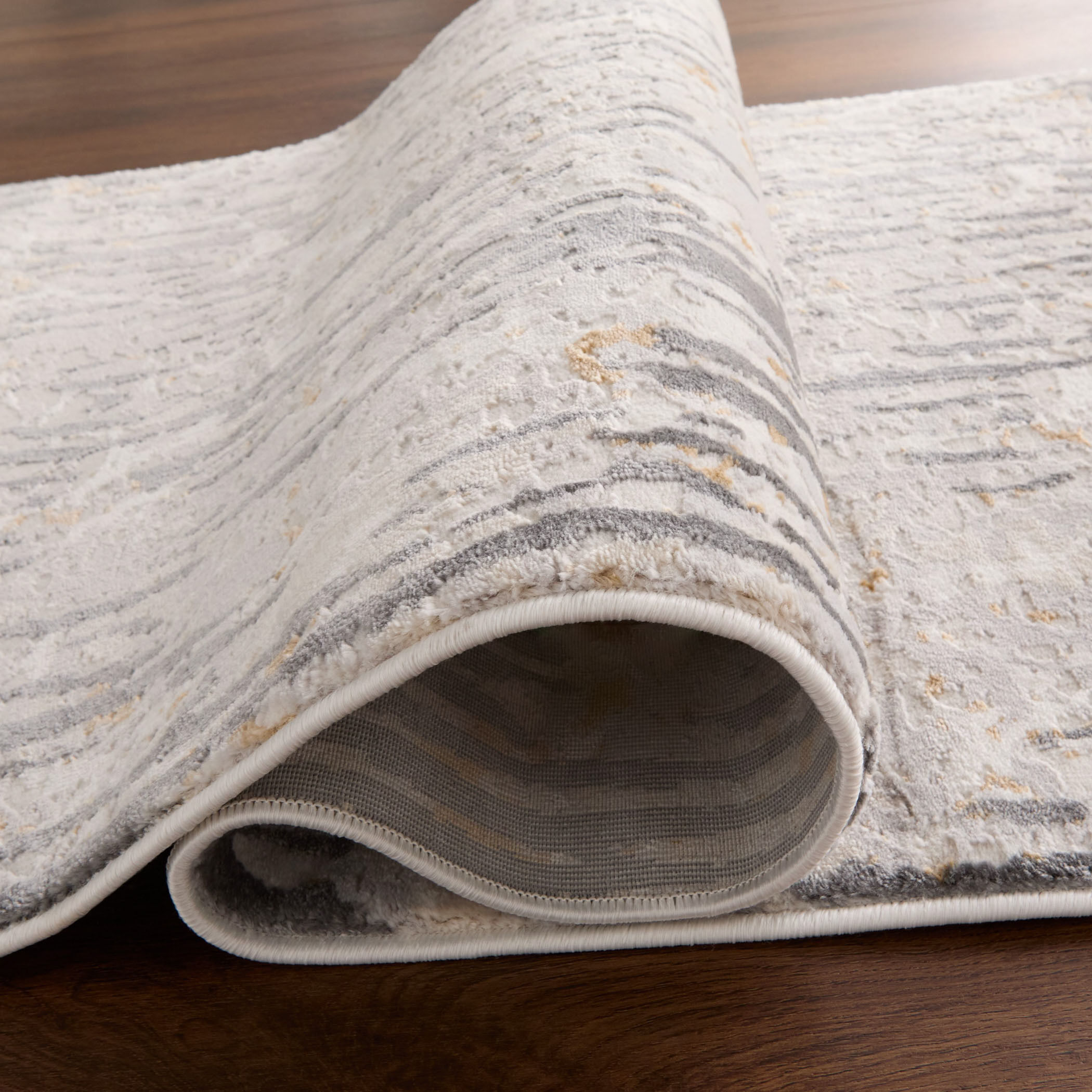 Veleka Gray and Gold Indoor Rug