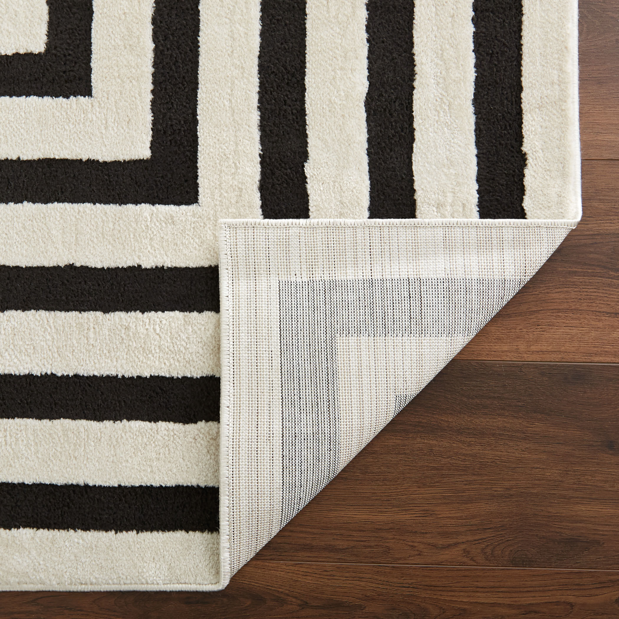 Optika 114 X 79 inch Black/White Rug in 6 x 9