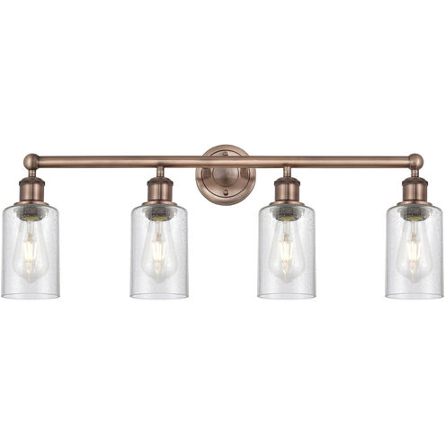 Clymer 4 Light 30.88 inch Antique Copper Bath Vanity Light Wall Light in Seedy Glass