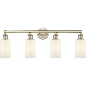 Clymer 4 Light 30.88 inch Antique Brass and Matte White Bath Vanity Light Wall Light